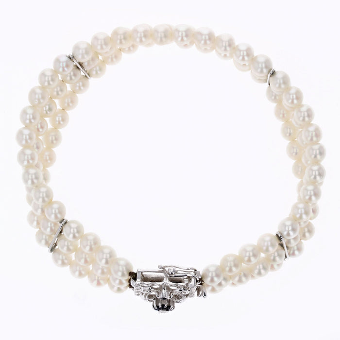 Bracciale con 3 fili di perle e chiusura in oro bianco