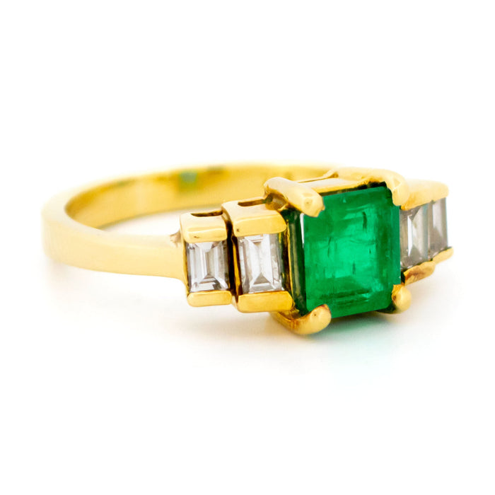 Yellow gold emerald diamond ring