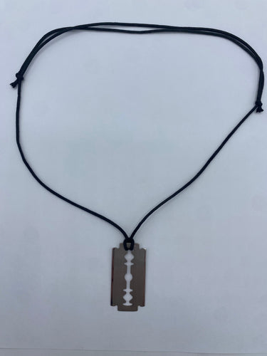 Pendentif Dinh Van - Pendentif "Lame de rasoir" GM sur cordon 58 Facettes 096424105792