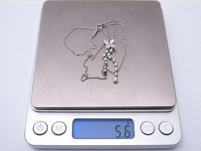 Collier collier tiffany victoria fleur pendante diamants platine 58 Facettes 259242