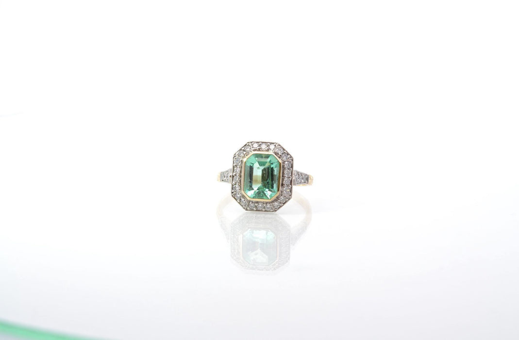 Anello certificato con diamante e smeraldo colombiano
