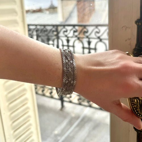 Bracelet Bracelet manchette tissé or gris 58 Facettes REF24086-249