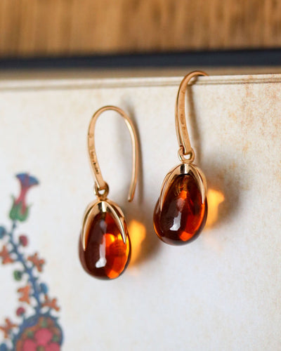 Boucles d'oreilles Paire de Boucles d'Oreilles signées "Pomellato" Or rose et Quartz de Madère 58 Facettes A11522