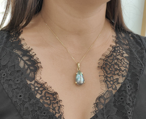 Pendentif Pendentif Mabé de Tahiti en or jaune 58 Facettes 33335