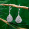Boucles d'oreilles Boucles d'oreilles or blanc, diamants, cristal de roche, monture cage gravée à la main 58 Facettes