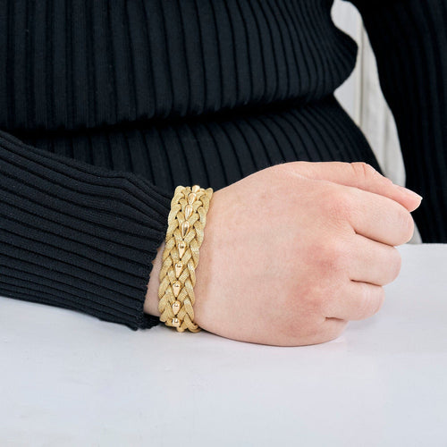 Bracelet Bracelet tréssé en or jaune 58 Facettes GAP1476