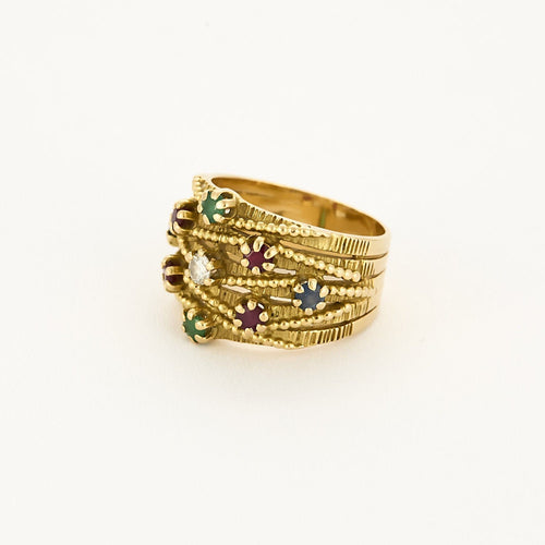 Bague 55 Bague bandeau mouvementée, or jaune, rubis, émeraudes et saphirs 58 Facettes B250458