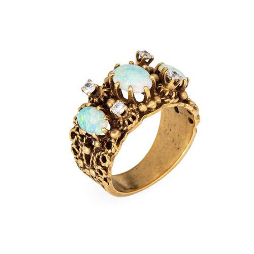 Bague Bague en or jaune, opale et diamant des années 60 58 Facettes G14025