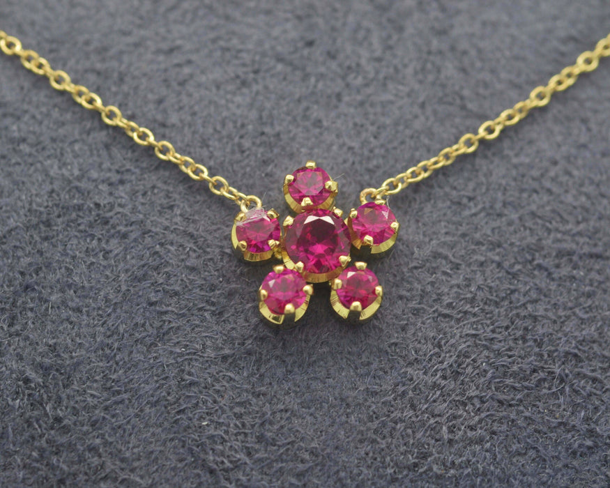 Collier fleur or et rubis 58 Facettes