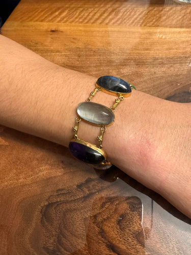 Bracelet Bracelet en or champagne 18 carats et pierres fines cabochon 58 Facettes