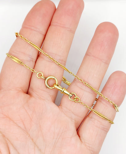 Chaîne giletière de montre antique or jaune 18k maillons finement travaillés (circa 1900) 58 Facettes A05186