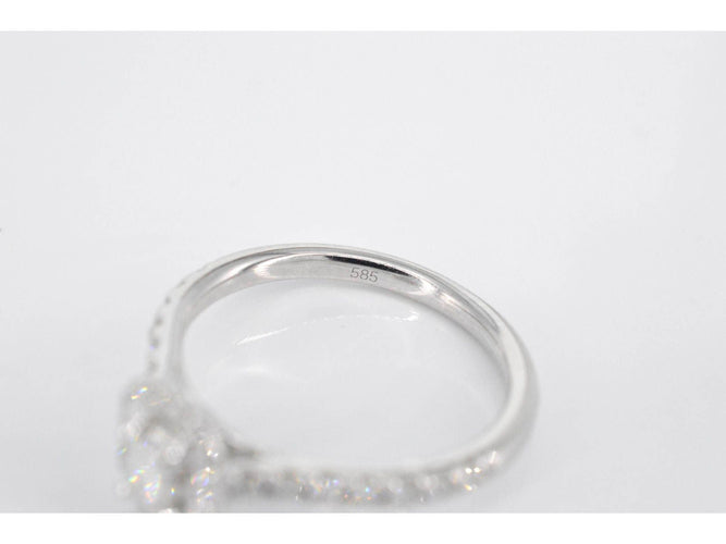 Bague 54 Bague entourage en or blanc avec diamants taille brillant et baguette 58 Facettes 2086