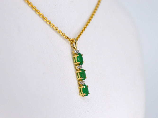 Pendentif Gold pendant with diamonds and emerald 58 Facettes 2141