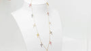 Collier CARTIER - Collier 11 Croix en or rose diamants et saphirs de couleurs 58 Facettes 32788