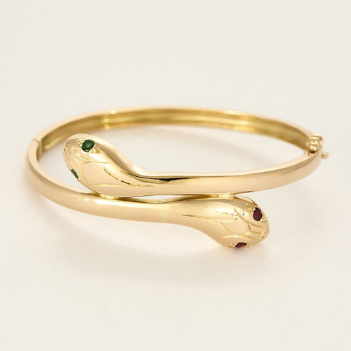 Armband "Schlange" aus Gelbgold, Rubinen und Smaragden 58 Facettes BIA1213