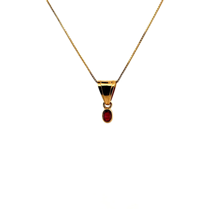 Yellow gold and ruby pendant