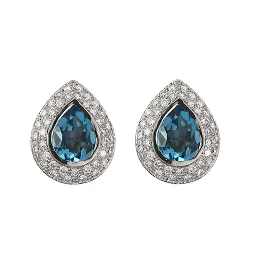 Boucles d'oreilles Boucles d'oreilles en or blanc, diamants et topaze bleue 58 Facettes LJ27