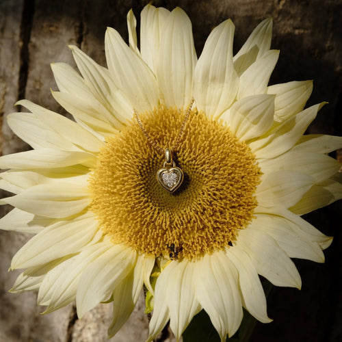 Pendentif Pendentif Cœur or jaune et diamants 58 Facettes INV035