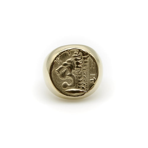 Vintage yellow gold lion-headed coin signet ring