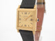 Montre vintage montre BOUCHERON carre 24 mm or jaune lezard mecanique 58 Facettes 258880