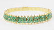 Bracelet Bracelet souple ancien en or jaune et émeraudes 58 Facettes 32752