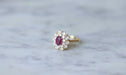 Bague Bague marguerite rubis entourage diamants 58 Facettes