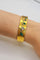 Bracelet Bracelet vintage des années 1970 en or jaune 20 carats, diamants et émeraudes 58 Facettes