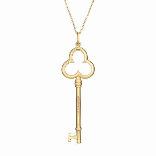 Collier Pendentif et collier clé trèfle Tiffany & Co. en or jaune 18 carats, signés 58 Facettes G14175