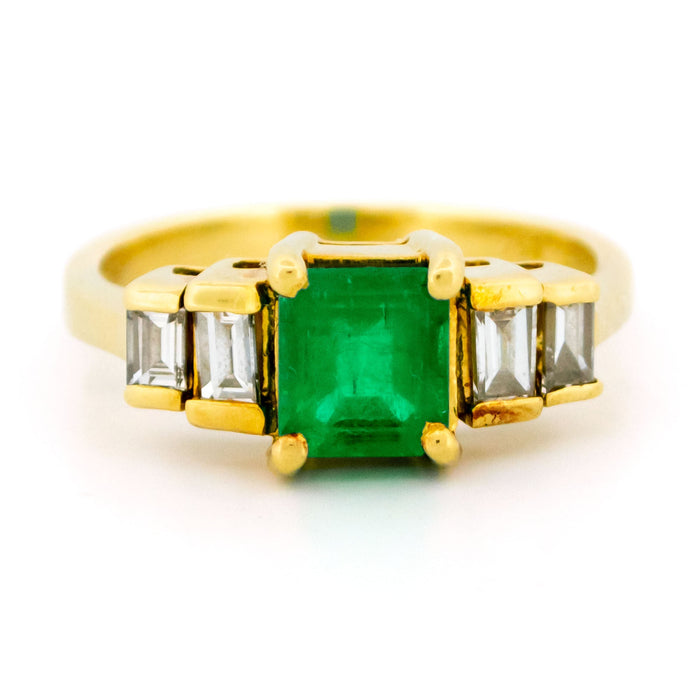 Yellow gold emerald diamond ring