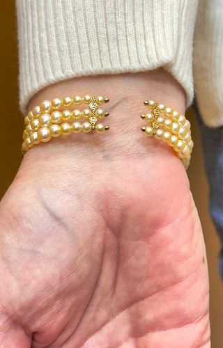 Bracelet Bracelet signé Alessio Boschi , or , perles et diamants jaunes 58 Facettes