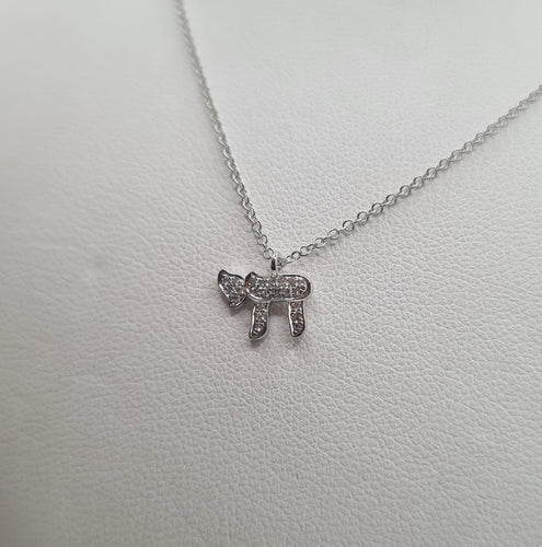 Collier Collier or blanc serti d’un pendentif HAI en diamants 58 Facettes