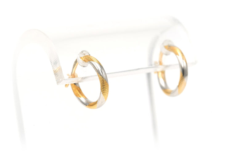 Boucles d'oreilles Boucles d'oreilles "créoles" contemporaines en or jaune et blanc 18 carats 58 Facettes B696