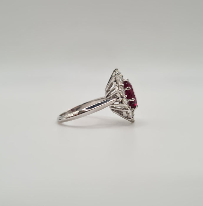 White gold ring set with a ruby and diamonds