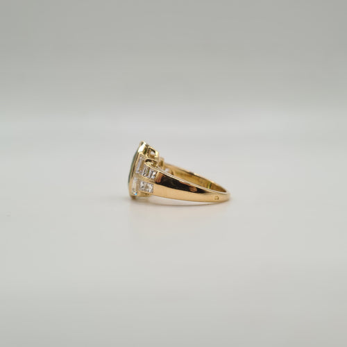 Bague 50 Bague or jaune 18 carats sertie d’un péridot et diamants naturels 58 Facettes