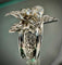 Bague 53.5 Bague fleur or blanc sertie d'un diamant de 0,43 carat (VVS-E/F) 58 Facettes