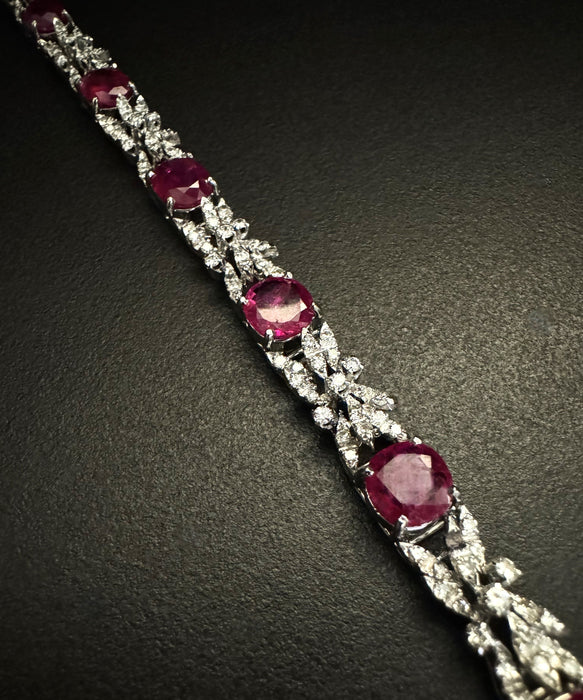 Bracciale mit Rubini je 14 ct und Diamant 3 ct.