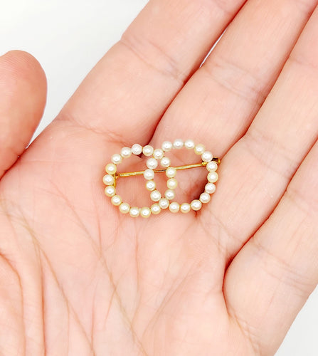 Broche Broche antique or jaune cercles infini et perles 58 Facettes A05616