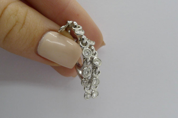 Boucles d'oreilles or blanc Dior Coquines 58 Facettes