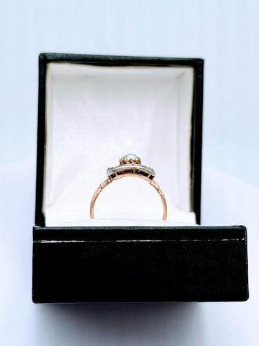 Bague 54 Bague XIXème en or rose sertie de rubis, perle et diamant 58 Facettes