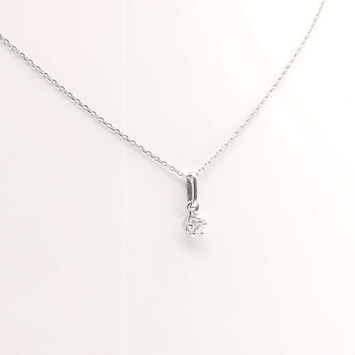 Collier Collier en or blanc serti d'un diamant de 0.15 carat 58 Facettes