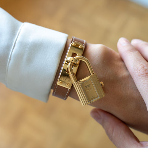 Montre Hermès - Montre Kelly cadran champagne en acier doré et verre saphir 58 Facettes