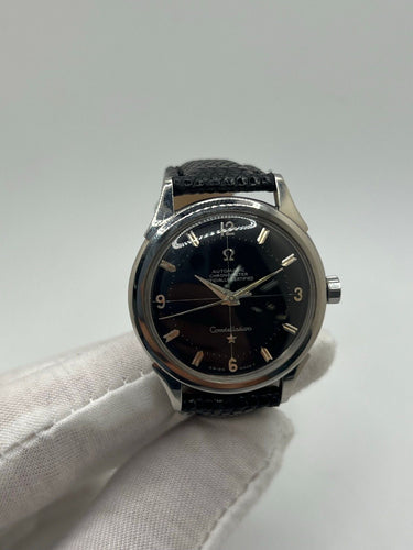 Montre Omega - Montre Constellation automatique acier cadran noir 35 mm réf. 2852 58 Facettes