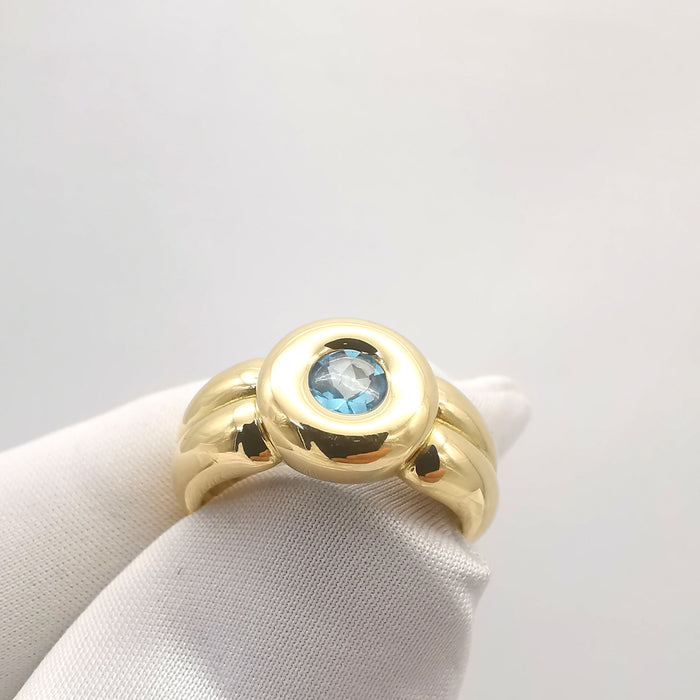 Anello in oro giallo con topazio