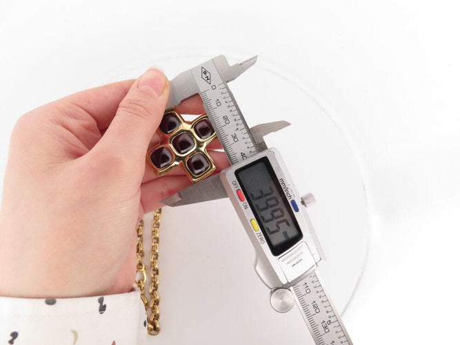 Collier collier POMELLATO pendentif croix grenats + chaine en or 18k 81gr 58 Facettes 267203