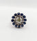 Bague 51.5 Bague marguerite Art Déco or blanc, diamant taille ancienne 0,65 carat et saphirs 58 Facettes A06329