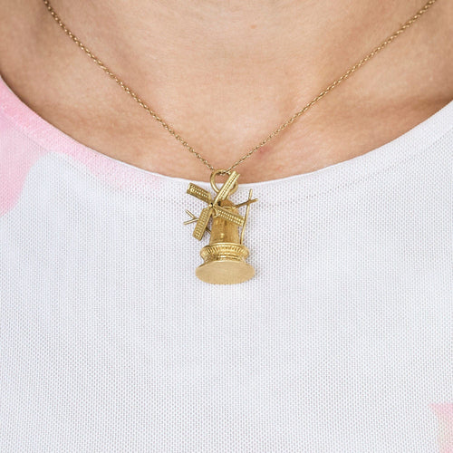 Pendentif Pendentif "Charm's" en forme de moulin à vent en or jaune 58 Facettes MAR07423
