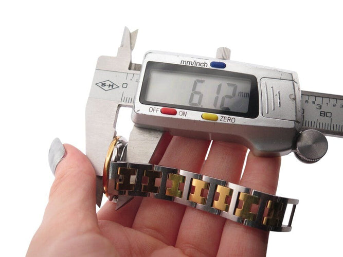 Montre vintage montre HERMES arceau 25 mm acier et plaque or quartz  plated 58 Facettes 268618