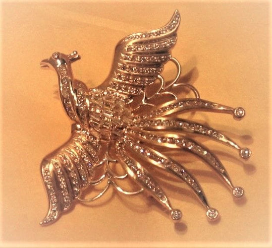 Broche Broche OISEAU DE PARADIS or jaune diamants 58 Facettes R 1137  MKEE