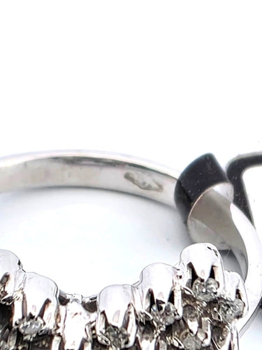 Bague 55 Bague en or blanc 18 carats sertie de diamants et ornée d'un diamant central 58 Facettes