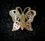Pendentif Pendentif en forme de papillon en or bicolore 58 Facettes